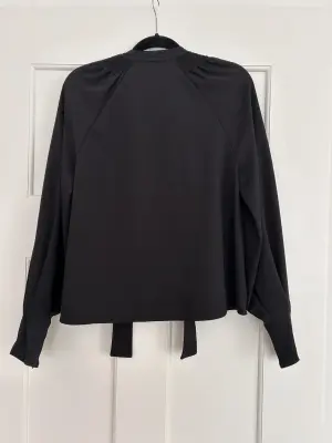 Red A shaped blouse with bow | LOOP Marketplace