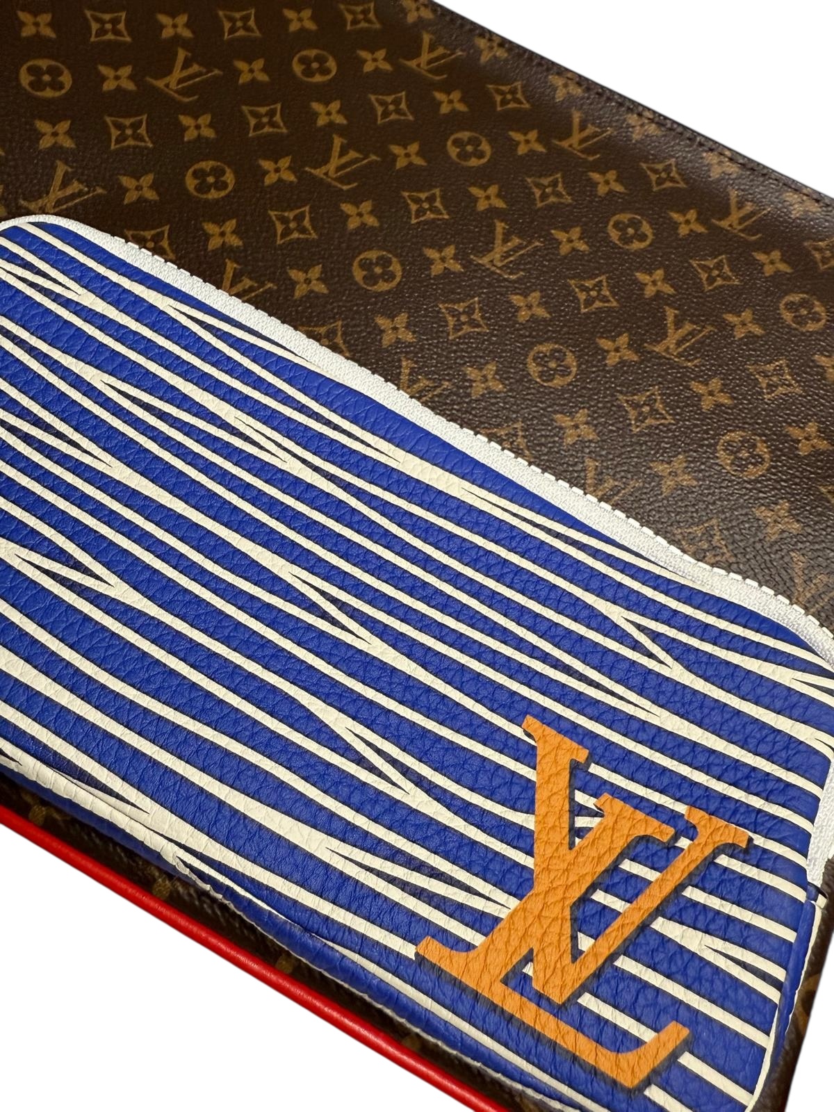 Louis Vuitton clutch | Marché LOOP